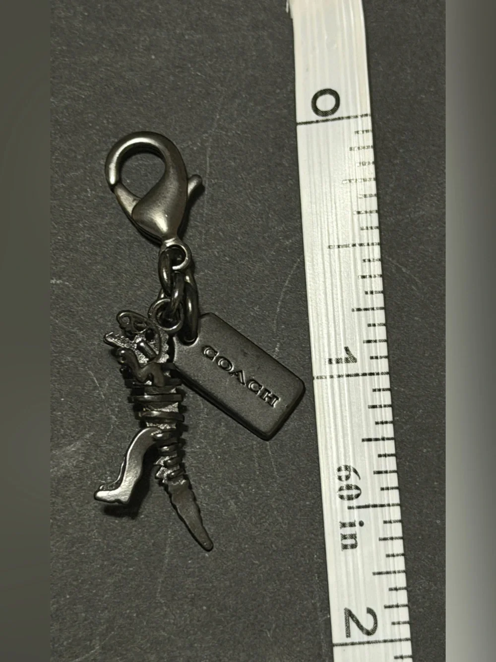Coach Black Gunmetal Rexy Charm with Signature Tags